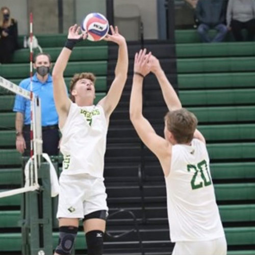 The men's volleyball team is in unison with sets, bumps, and spikes